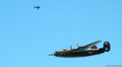 B-24 with Corsair in background