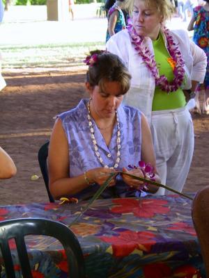 Making a headband from palm fronds