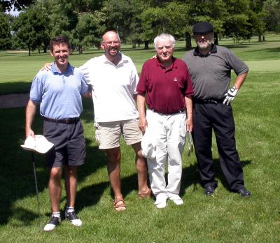 I caddy for Dutch, Eric and Dad at Rockford Country Club golf course