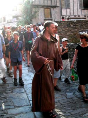 Monk leading followers