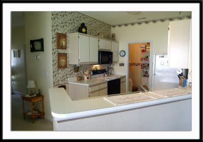 View from living room into the kitchen.