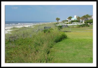 The view along the coast at 65th Street North. This area contains mostly private homes in a section between coastal hotels about a mile away in both directions.