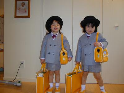 Naomi and Anna in school uniforms