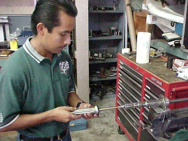 Setting the bearing pre load on the main shaft.