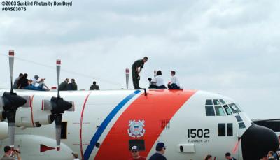 Coasties on wing of HC-130H CG-1502 military aviation air show stock photo #6897
