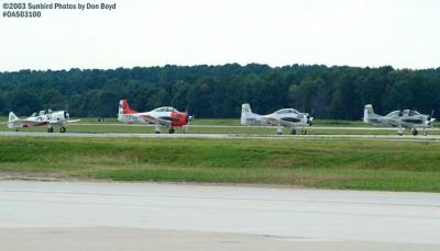 Four warbirds in takeoff position stock photo #6958