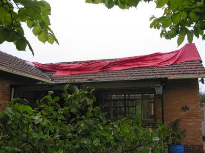 tarp covering the roof