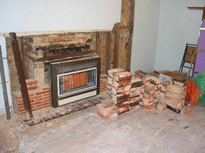 demolishing the fireplace