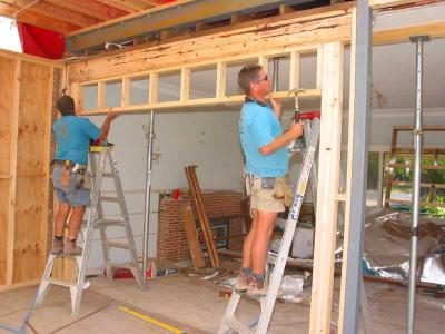 framing above a pair of sliding cavity doors