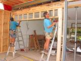 framing above a pair of sliding cavity doors
