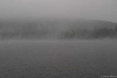 Echo Lake with fog snow and rising steam.