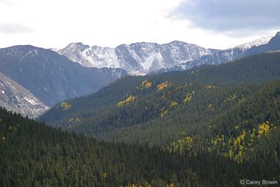 Rocky Mountain peaks with a touch of fall colors.
