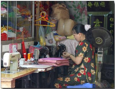 Sidewalk seamstress