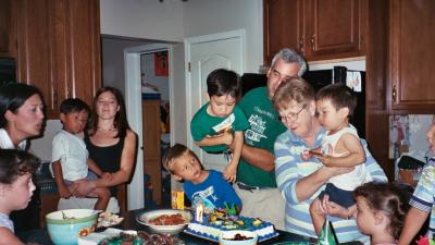 Steven blowing out the candles at his 5th birthday party