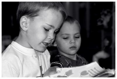 Reading to My Brother
Josh was able to read at 4, and his Kindergarten teacher says he is reading at the 3rd grade level now at 5.  Here he is reading a story to Jonah.