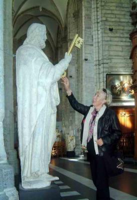 Martha having a private comversation with St Peter, in order to get a free passage when needed. She was raised as an atheist, still a pass partout might come in handy
