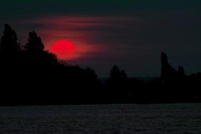 Fire setting over Lake Constance