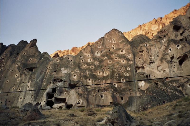 Pigeon wall in Soganli from moving car