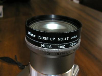 The lens showen here is a 52mm canera end and has 52mm filter end.
The lens can be bought in different sizes.

by:  Stinson