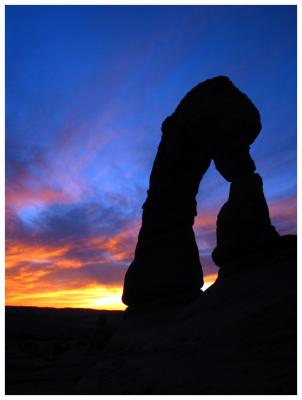 Sunset behind Delicate Arch