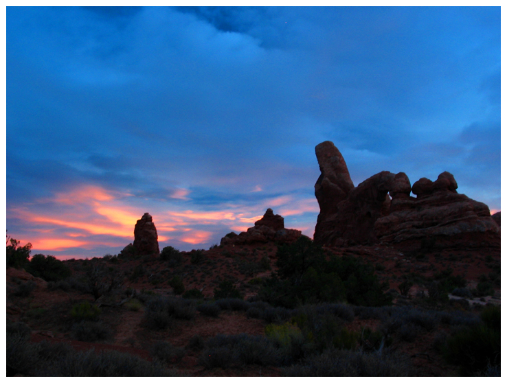 Sunset behind Turret Arch