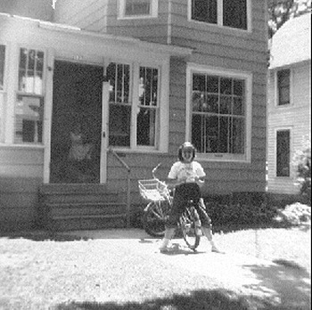 Sue, June 1953 (Laura in doorway - sometimes we let her out :)