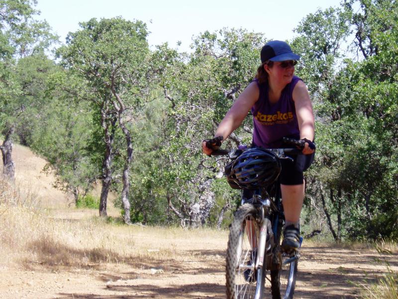 Cathy finishing climb on trail