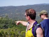 Mustang Peak.  Tom pointing to hinterlands