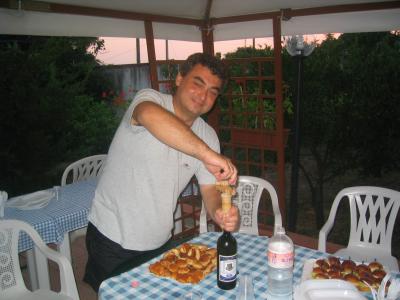Nuncio opens his wine.jpg