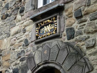 A year marker above a castle door.