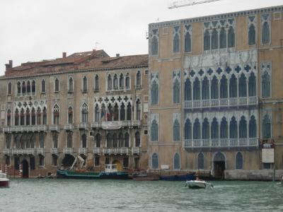 Some of the ones under construction have these printed cloths over the scaffolding: can you tell which side is real?