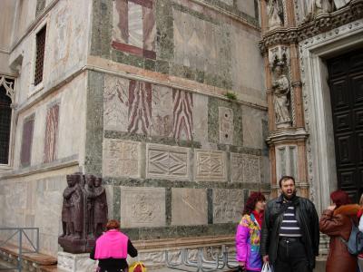 The multicoloured marble of San Marco's facade.