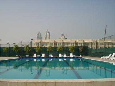 The pool, the faculty housing, and the new high rise aparments bldgs to the south of the campus