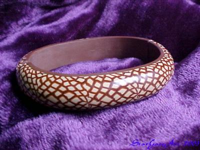 u33/stargazer/medium/21739068.BrownSnakeSkinBracelet.jpg