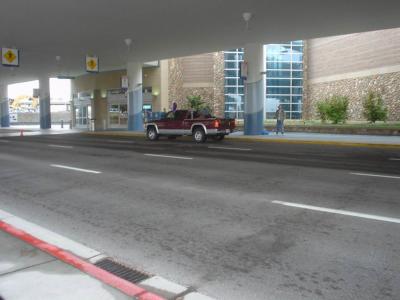 a boise state fan. i had no zoom, but his truck had lots of blue and orange on it