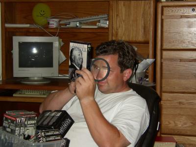Jim and his MASSIVE magnifying glass.