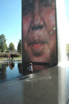 kid running in pond