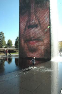 kid running in pond
