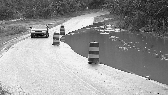 Lost River in the road at the quarry at Warden Ridge (WV 55/259)