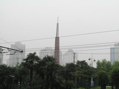 palms, highrises, and a beautified chimney