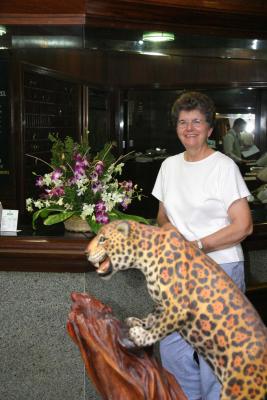 Shirley with carving of a jaguar of Hotel Tropical of Manaus