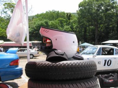 My helmet sitting on a spare tire wider than the Swift's race tires