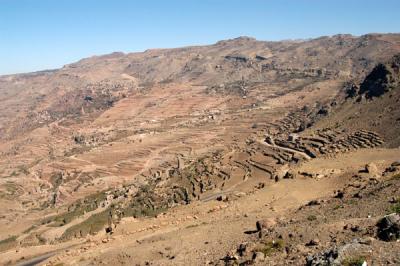 An hour or so out of Sana'a, the road descends a mountainside covered with terraced fields
