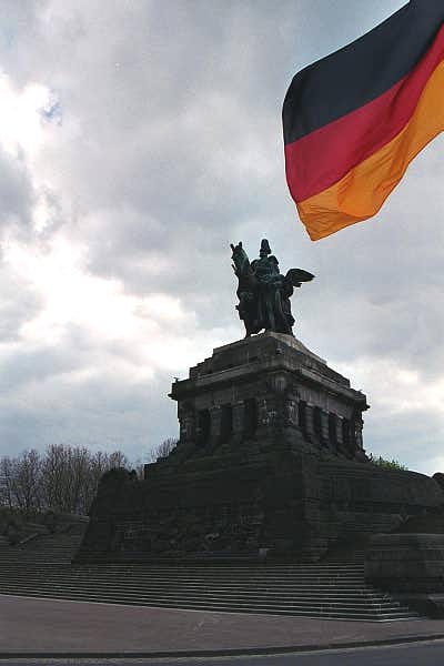 German flag and the Kaiser Willem Monument