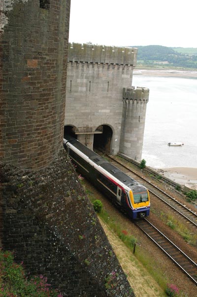A train crosses the bridge at Conwy Castle