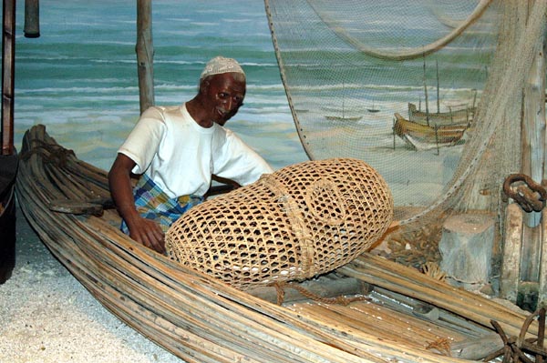 Fisherman in a small boat, Bahrain National Museum