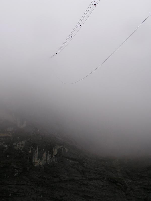 Cable car ride down from Gimmelwald went through the clouds-see the cable?