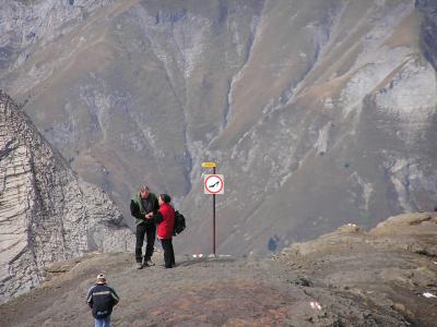 NO HEELS on the mountain (except the lady next to the sign)
