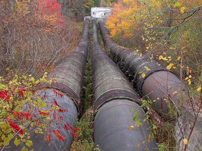 Wooden feeder tubes for hydro dam