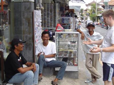 Clint doing a few card tricks with the Balinese locals whilst out shopping.
